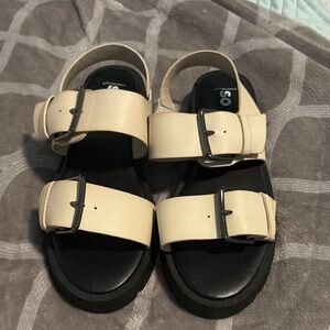 SO Cream and Black Buckle Sandals